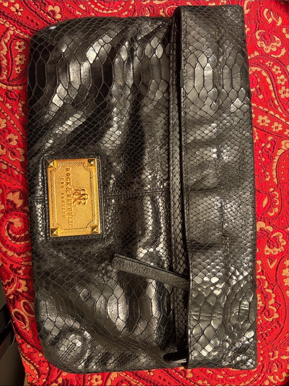 Rock & Republic Black Faux-Snake Skin Clutch with Gold Plaque